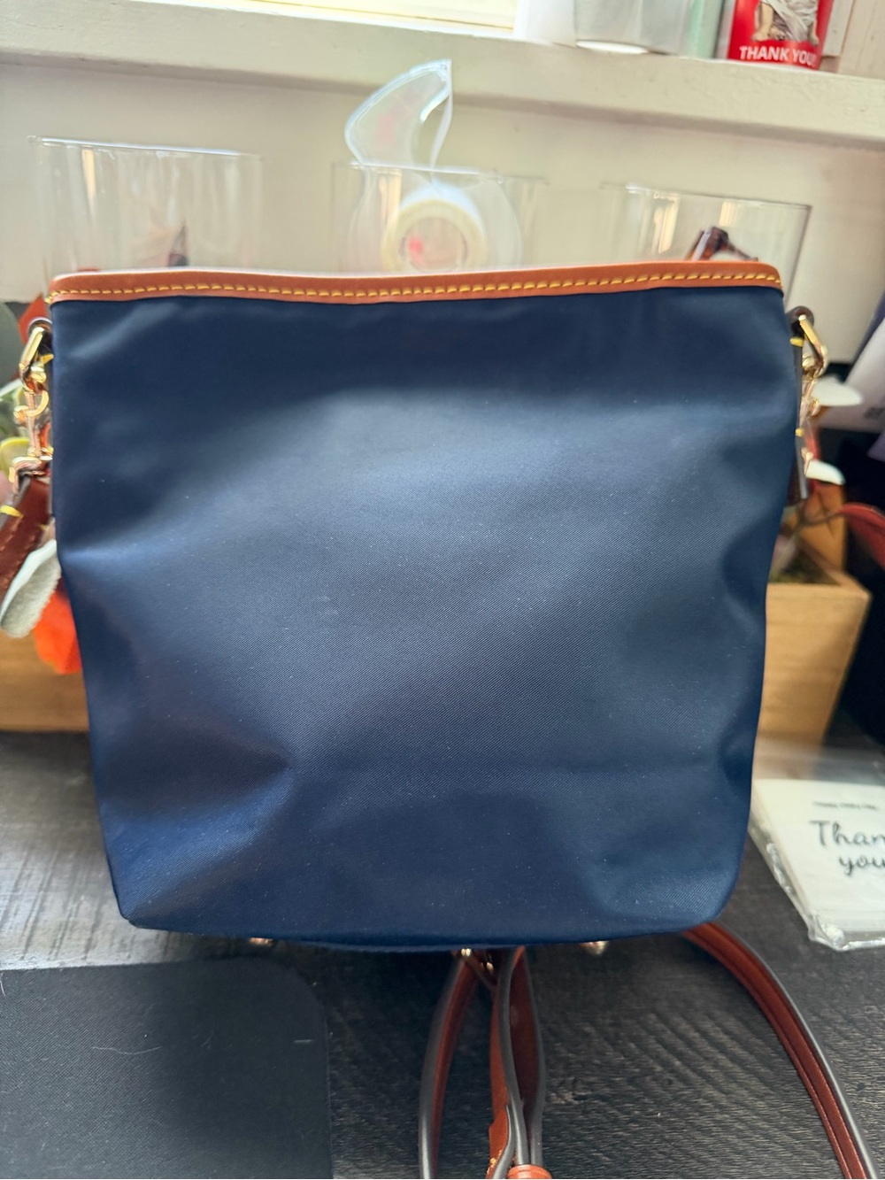 Dooney & Bourke Navy Crossbody with Brown Leather Trim and Red Accent - Picture 8 of 14
